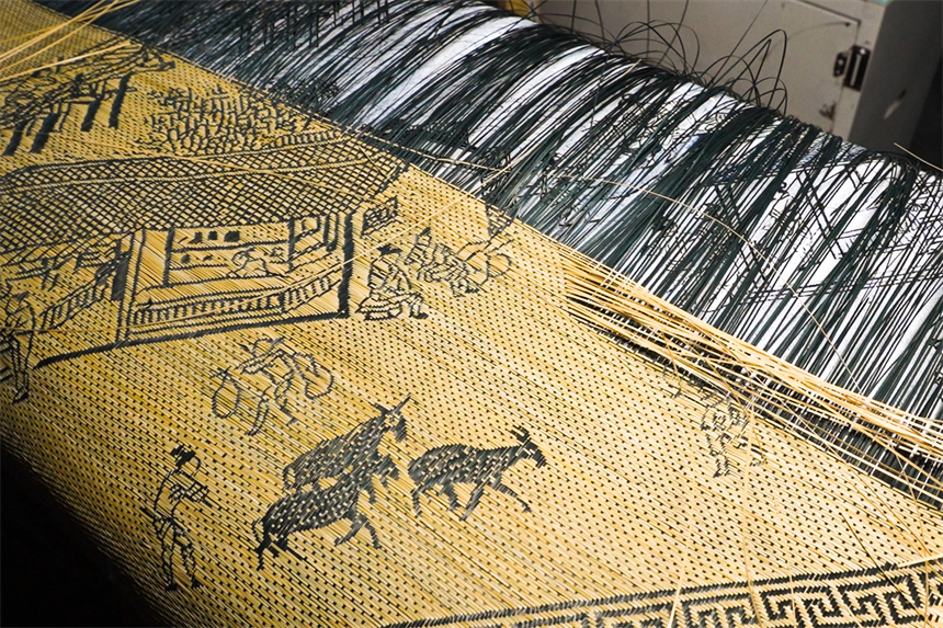 徐建元編織的明代仇英版《清明上河圖》局部。人民網 孔文進攝